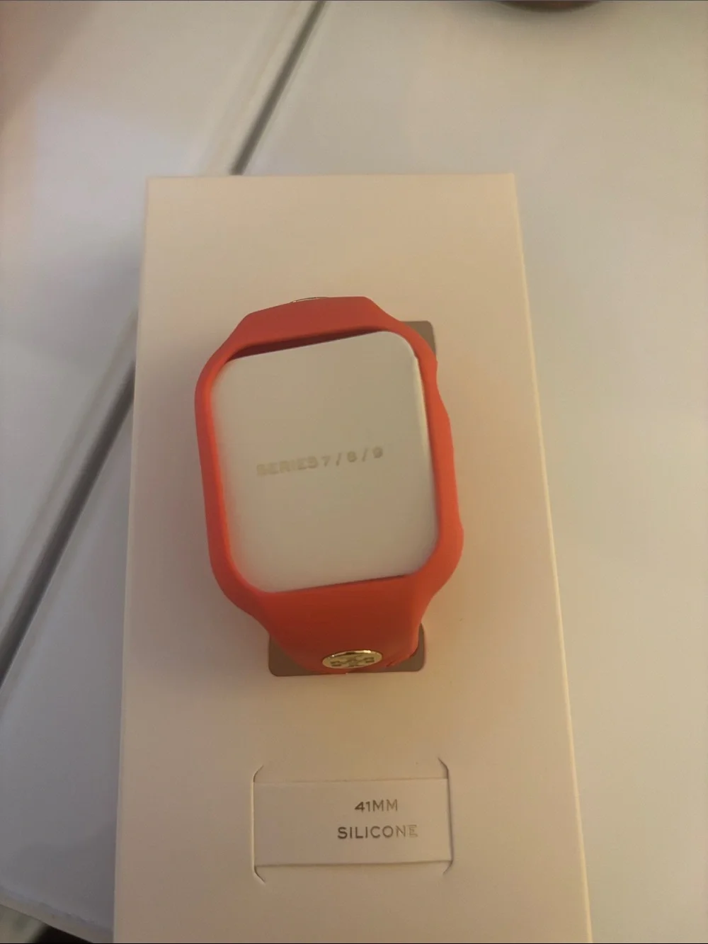 Tory Burch Orange Silicone Wristband with Gold Logo Accent No box worn 1 time